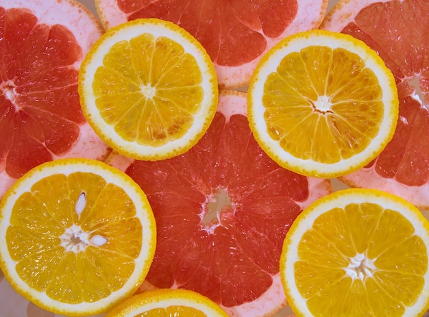 Orange and grapefruit rings background