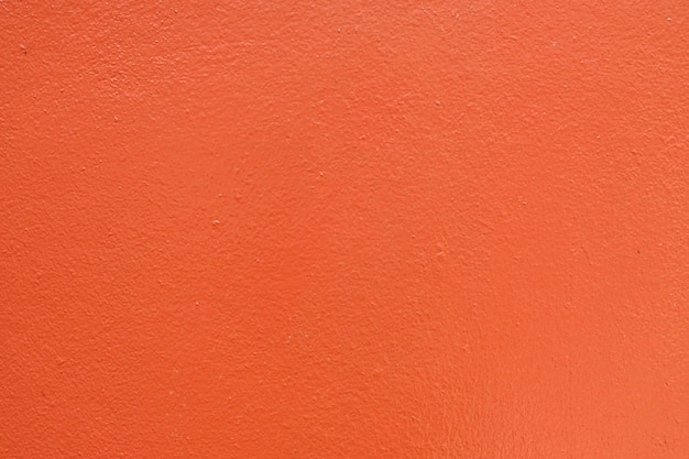 Orange grunge texture cement wall. copy space