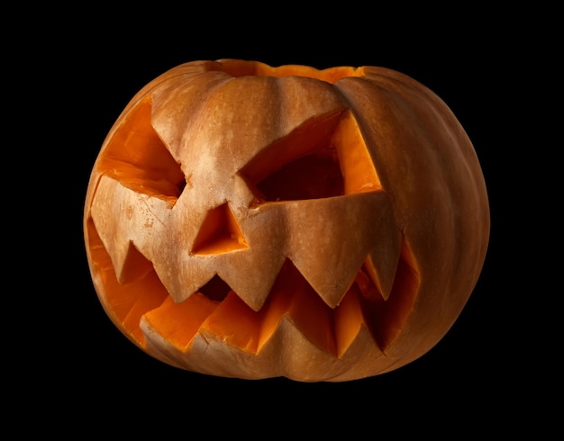 Orange halloween pumpkin on black background