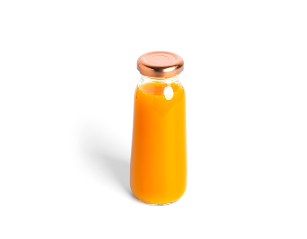 Orange juice in bottle isolated on a white background. . High quality photo