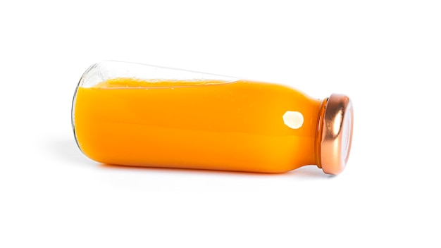 Orange juice in bottle isolated on a white background. . High quality photo