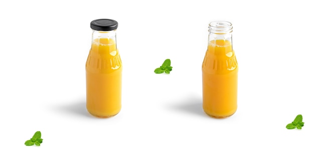 Orange juice in bottle isolated on white.