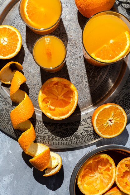 Orange juice from above on gray walls