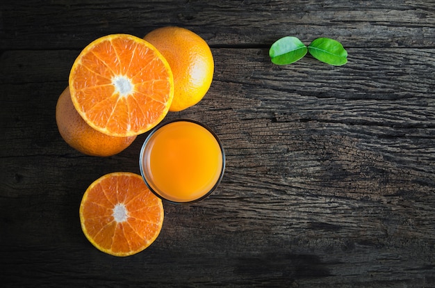 Orange juice from above on wood table