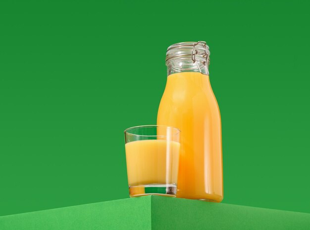 Photo orange juice in a glass bottle and glass healthy drink and summer