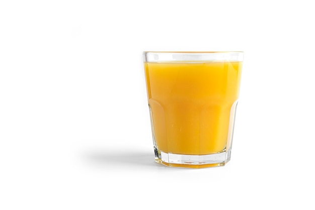 Orange juice in glass isolated on white.