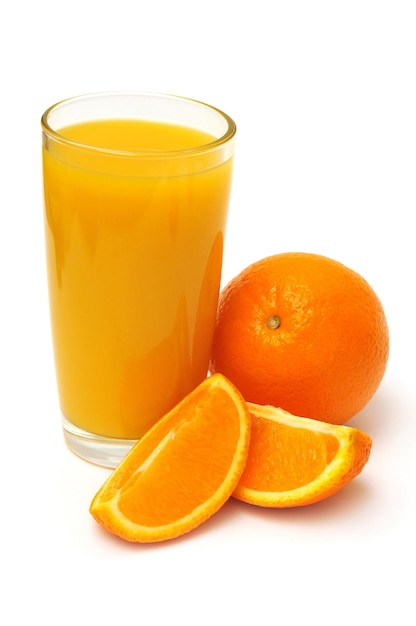 Orange juice in a glass and oranges isolated on white background