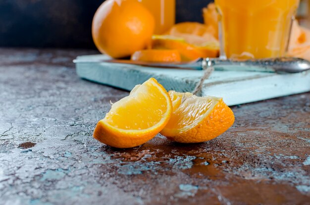 Orange juice in a glass and pieces