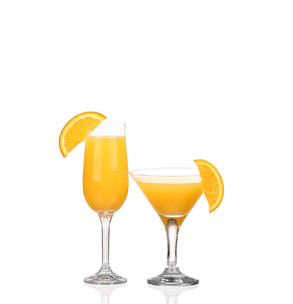 Orange juice and slices of orange isolated on white