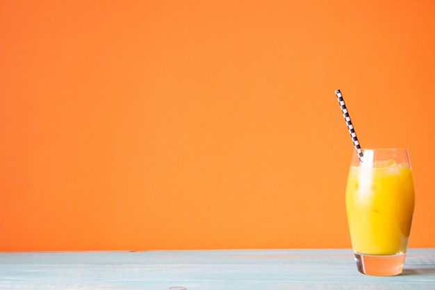 Photo orange juice with ice. orange  . summer  .