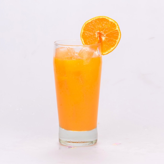 Orange juice with orange background and white