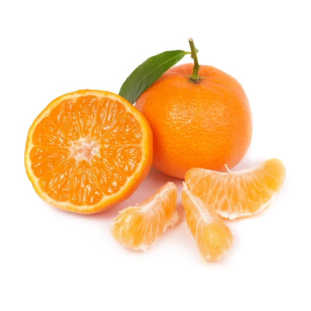 Orange mandarin with green leaf isolated on white wall