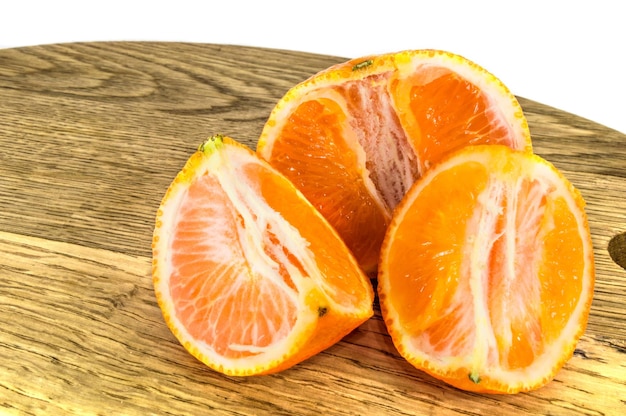 Orange mandarins  tangerine peel or mandarin slice isolated on white background Closeup photos of fresh citrus fruit