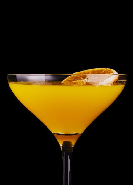 Orange martini or Margarita cocktail on black