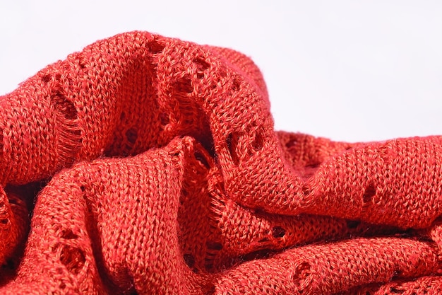 Orange openwork knitted closeup