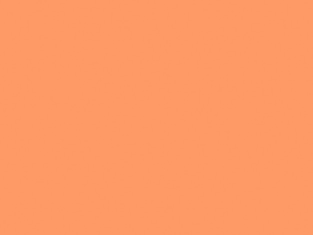 オレンジ色の紙のテクスチャ背景