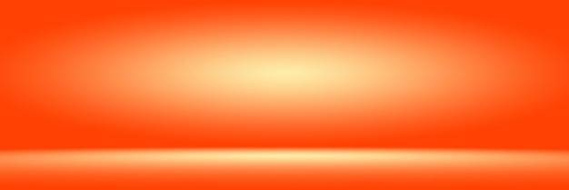 Orange photographic studio background vertical with soft vignette Soft gradient background Painted canvas studio backdrop