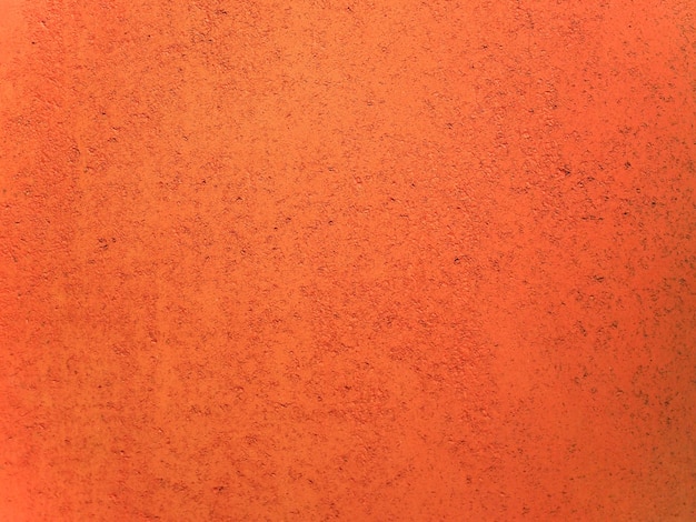 オレンジ色の漆喰壁の背景