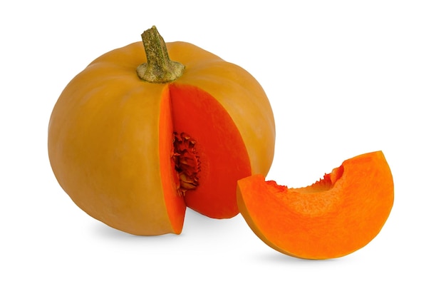 orange pumpkin on a white background a slice of pumpkin