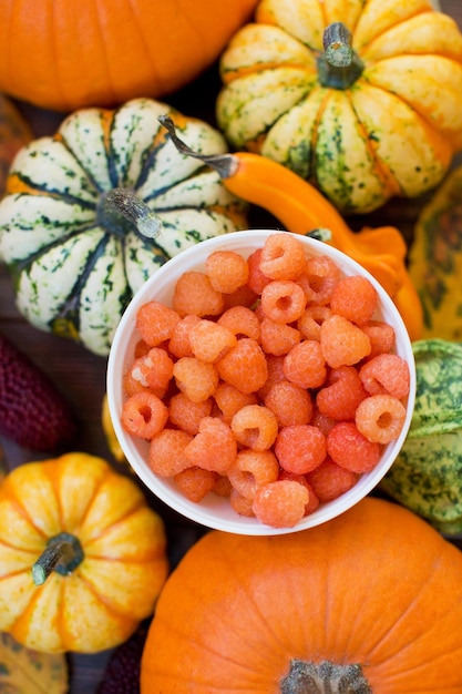 Orange raspberry and autumn pumpkins