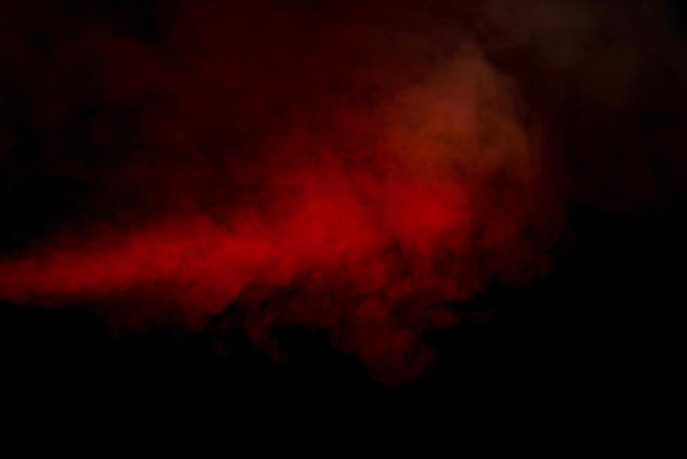 Orange and red steam on a black background Copy space