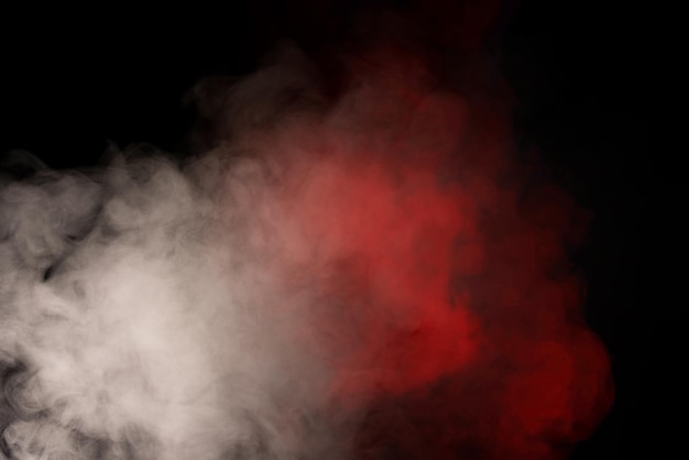 Orange and red steam on a black background Copy space