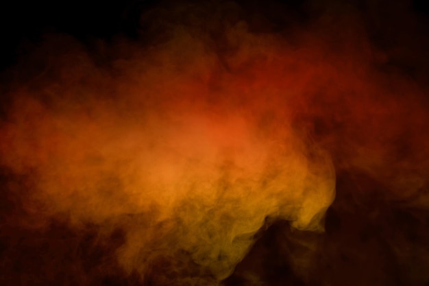 Photo orange and red steam on a black background copy space