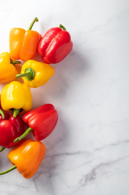 Orange red and yellow bell peppers