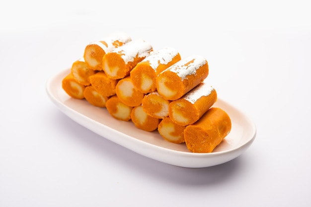 Orange Roll barfee or barfi sweet or Mitlai