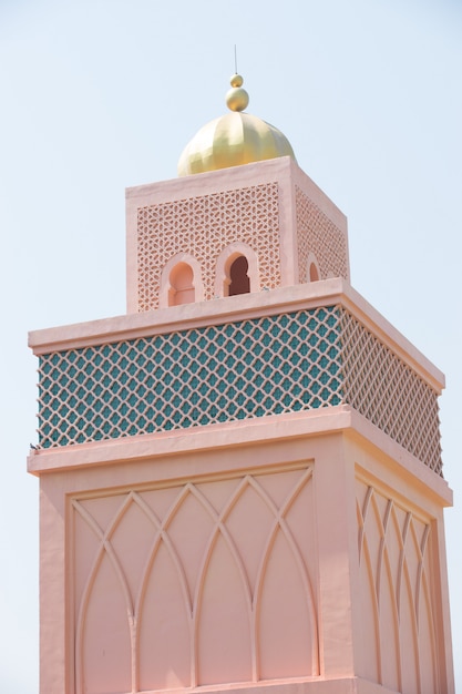 Foto fondo arabo sabbioso arancio della torre di stile di morrocco