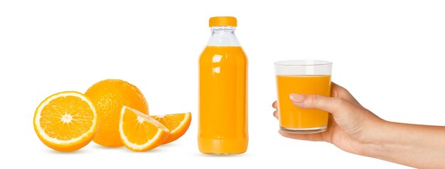 Photo orange set whole orange slices juice in a bottle the hand holds a glass of juice isolated on white background