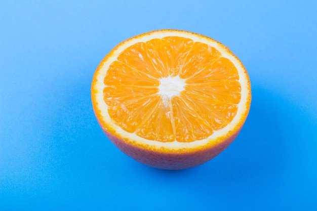 Orange slice on blue background