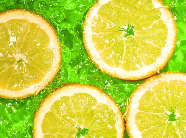 Orange slice in green water with waves