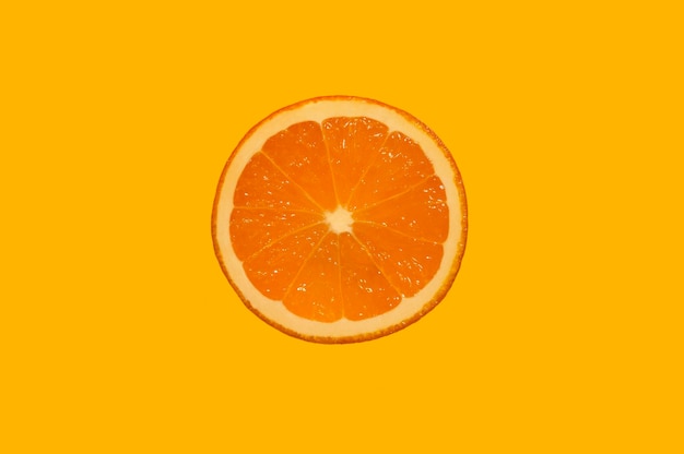 orange slice on orange background