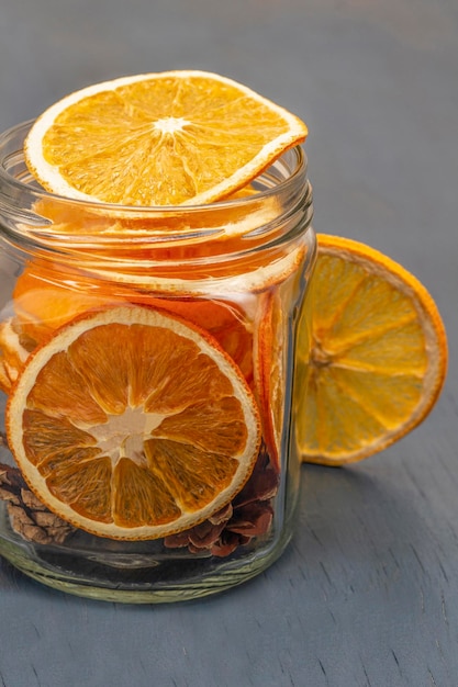 Orange slices in a glass jar Close up