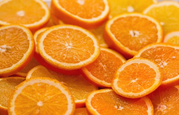 Orange slices texture fresh ripe sweet orange citrus fruits background