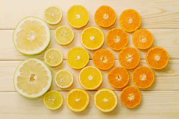 Orange slices on wooden board