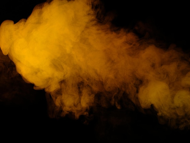 Orange smoke on black background