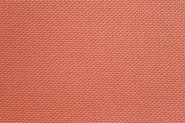 Photo orange strand weave texture background.