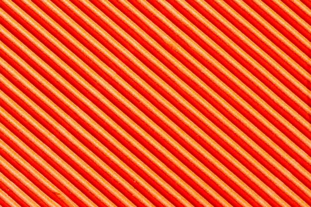 オレンジ色の縞模様の用紙の背景