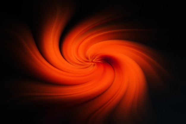 Photo an orange swirl with a black background.