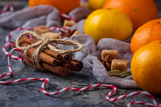 Orange tangerines and Christmas spices. Selective focus