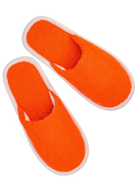 orange terry bath slippers isolated on a white background