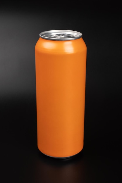 Orange tin can with copy space on dark background