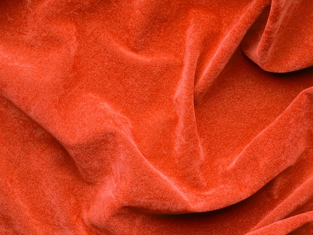 Orange velvet fabric texture used as background empty orange\
fabric background of soft and smooth textile material there is\
space for textx9