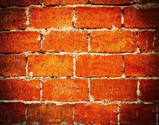 Orange wall tiles background