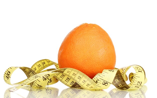 Orange with measuring tape on white