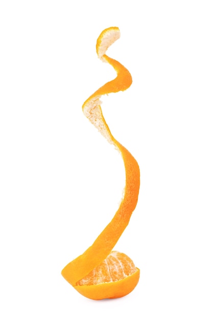 Orange with peeled spiral skin on white background