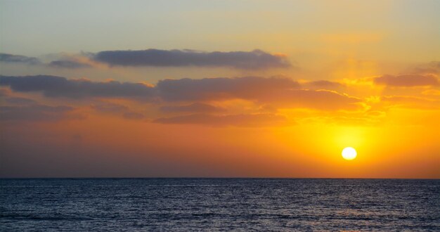 Orange and yellow sunset over the sea