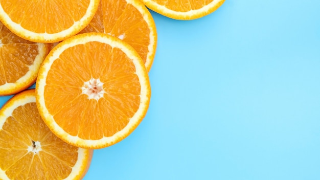 Oranges fruit on a blue background